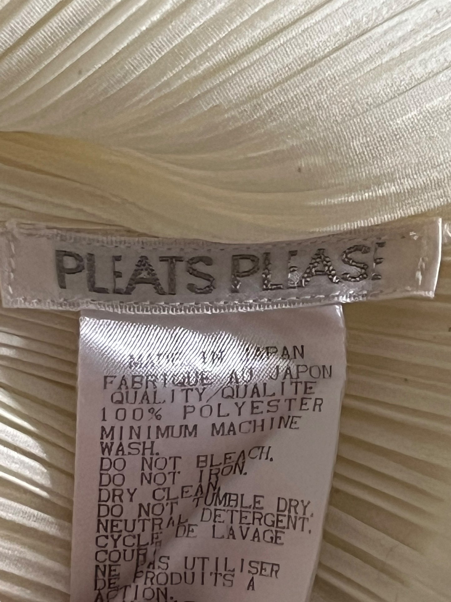 PLEATS PLEASE by Issey Miyake Ivory Sleeveless Turtleneck Top (S-M)